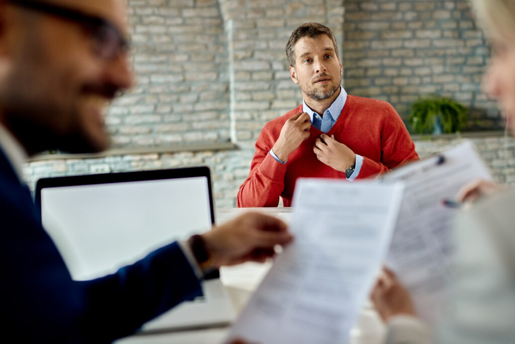 Male candidate having a job interview in the office.